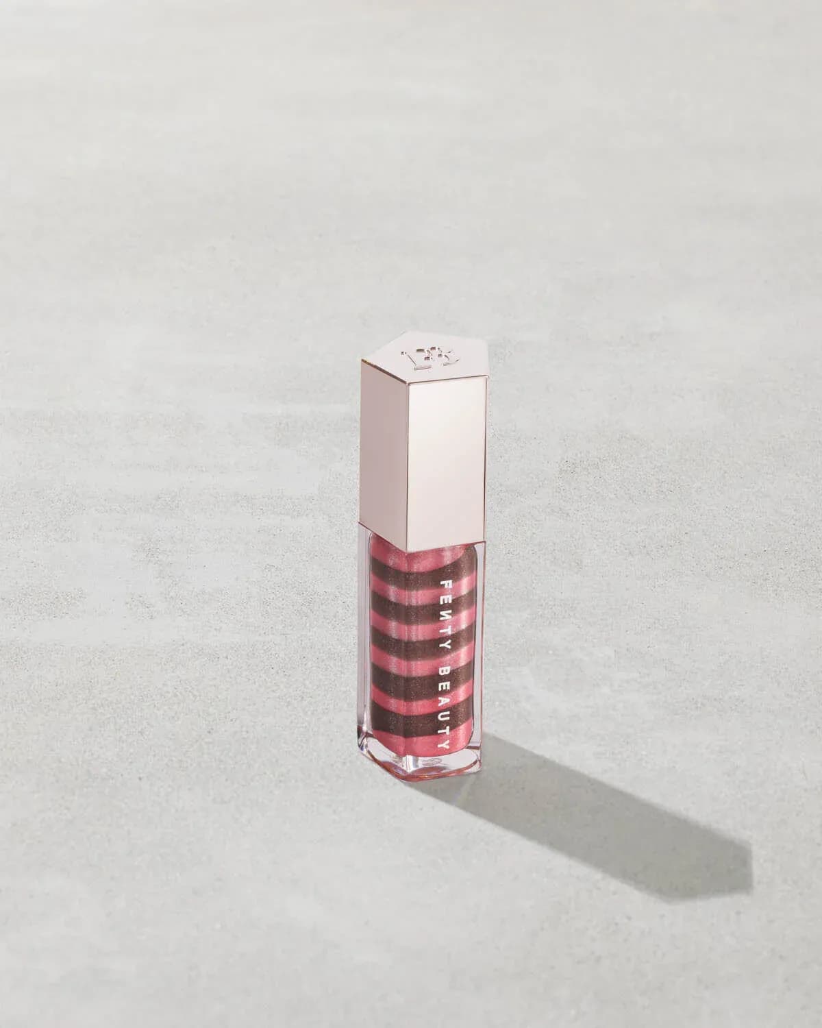 fenty beauty gloss bomb swirl-fussy flex